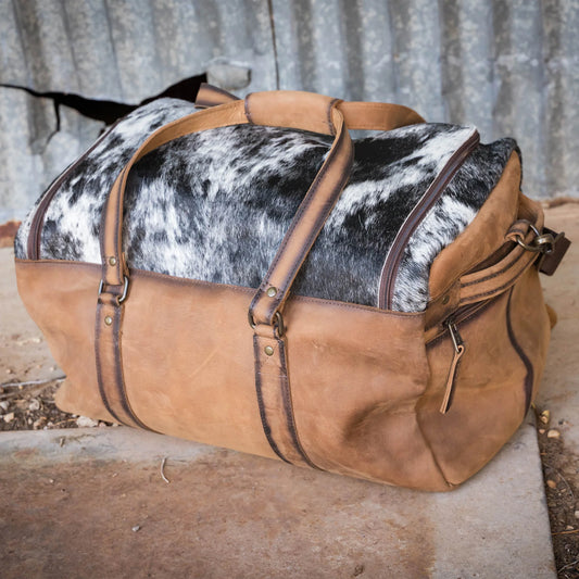 COWHIDE SMALL DUFFLE