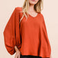 BUBBLE SLEEVE RUST TOP