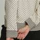 POLKA-DOT CREAM.BLACK ZIP TOP