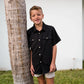 YOUTH PERFORMANCE SHIRT SOLID BLACK