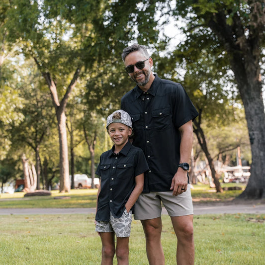 YOUTH PERFORMANCE SHIRT SOLID BLACK
