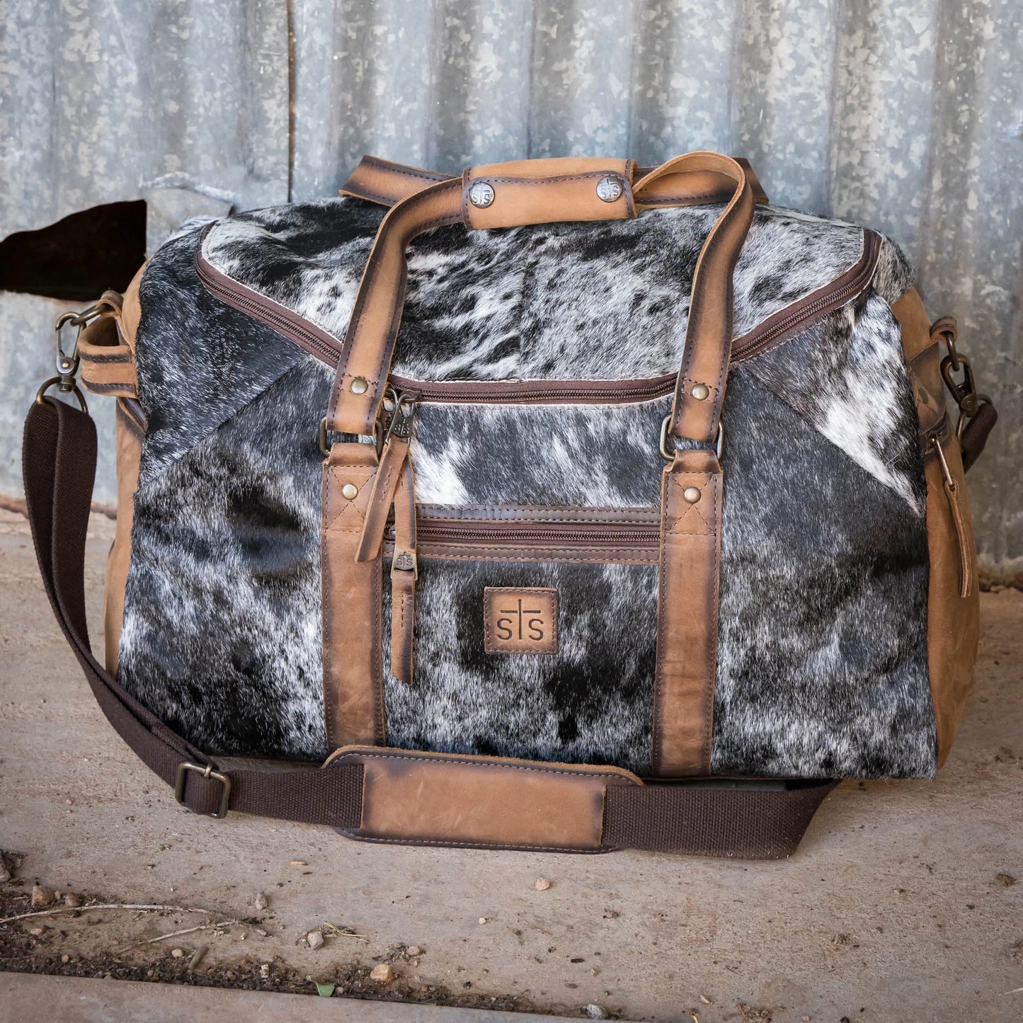 COWHIDE SMALL DUFFLE