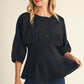 SOLID BACK PEPLUM TOP